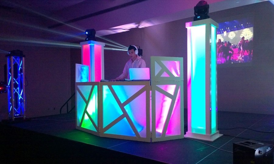 Explore-a-DJ-booth-setup-energizing-an-event-crowd.