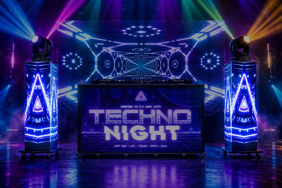 Column LED Screen integrated with DJ booth for layered stage visuals
