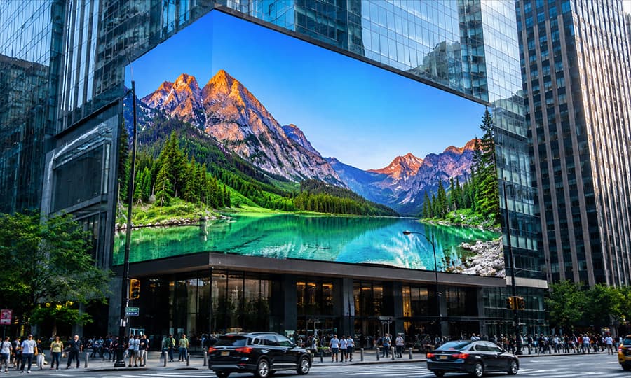 Large outdoor P4 LED digital billboard on a city building