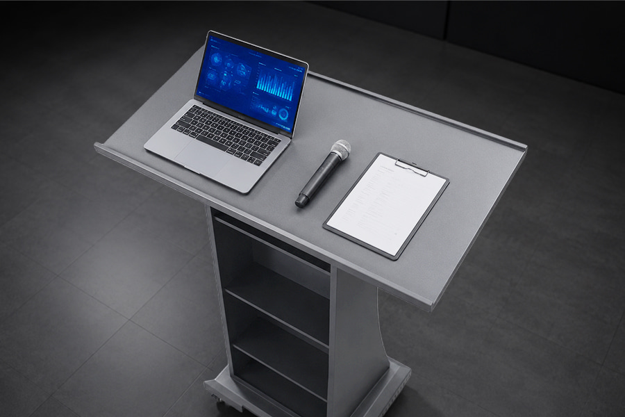 Wide LED podium tabletop with laptop and microphone